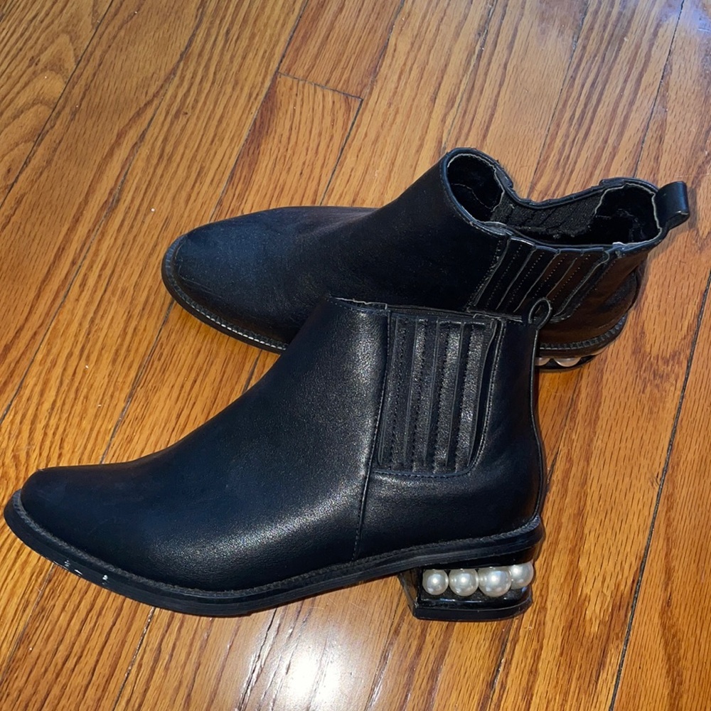 Black booties with pearl heels